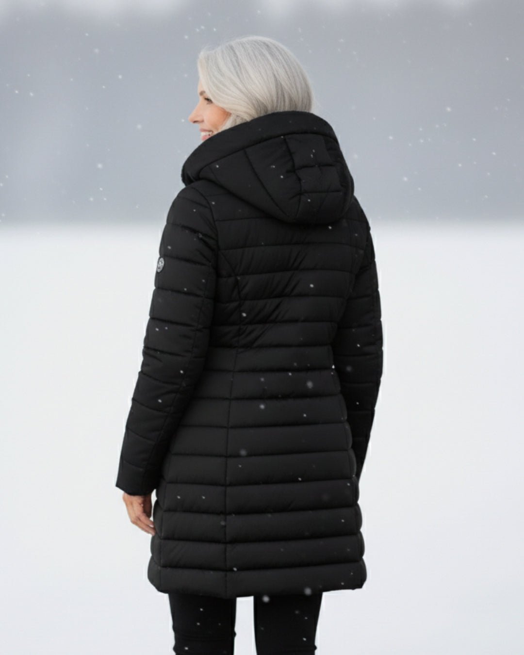 Doudoune Longue Matelassée Cintrée à Capuche Fausse Fourrure - Emilia Lane